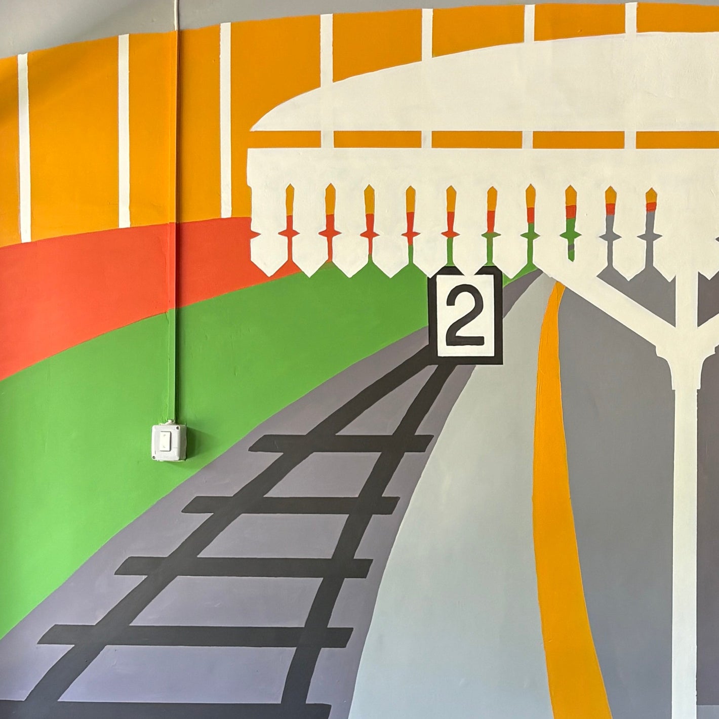 mural of train station platform
