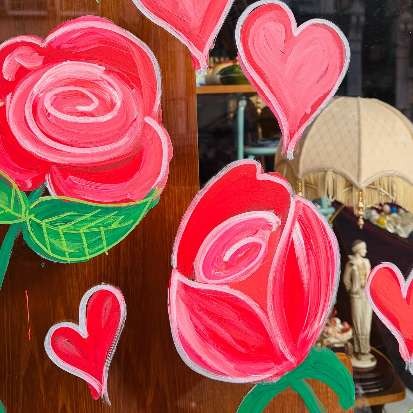 window mural of roses and hearts